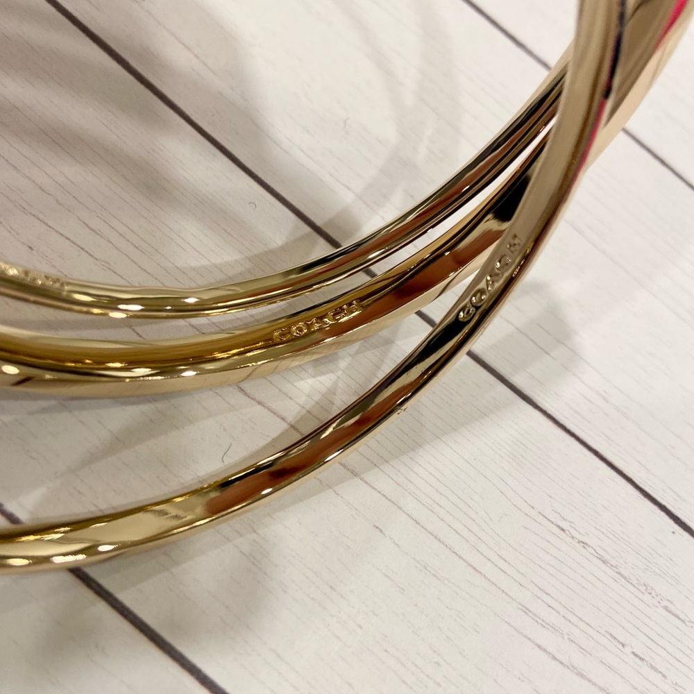 NWT! Coach set of 3 bangle bracelets. Gorgeous set in gold, white + Gift wrap - Picture 10 of 16